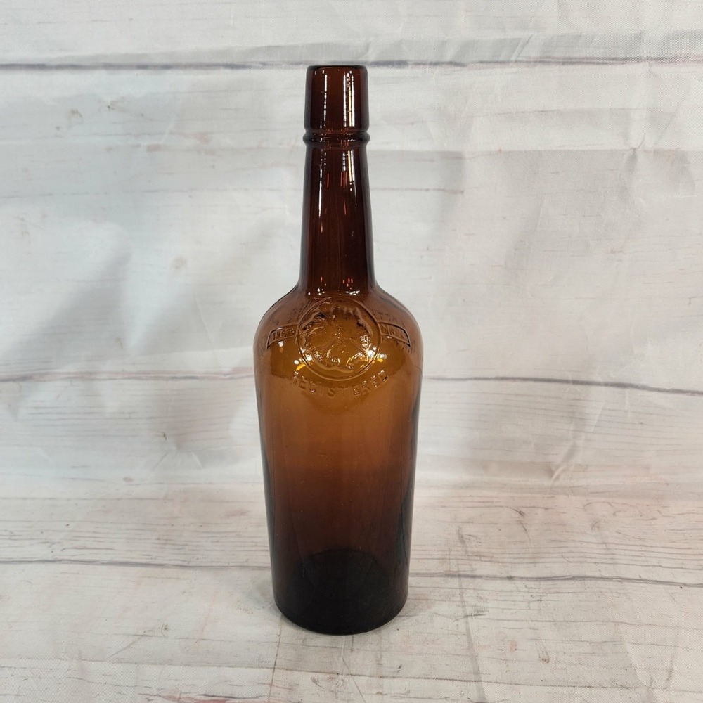 Antique Amber Glass Bottle Marked MOORE CO PROPERTY OF HL KEE & CO Embossed